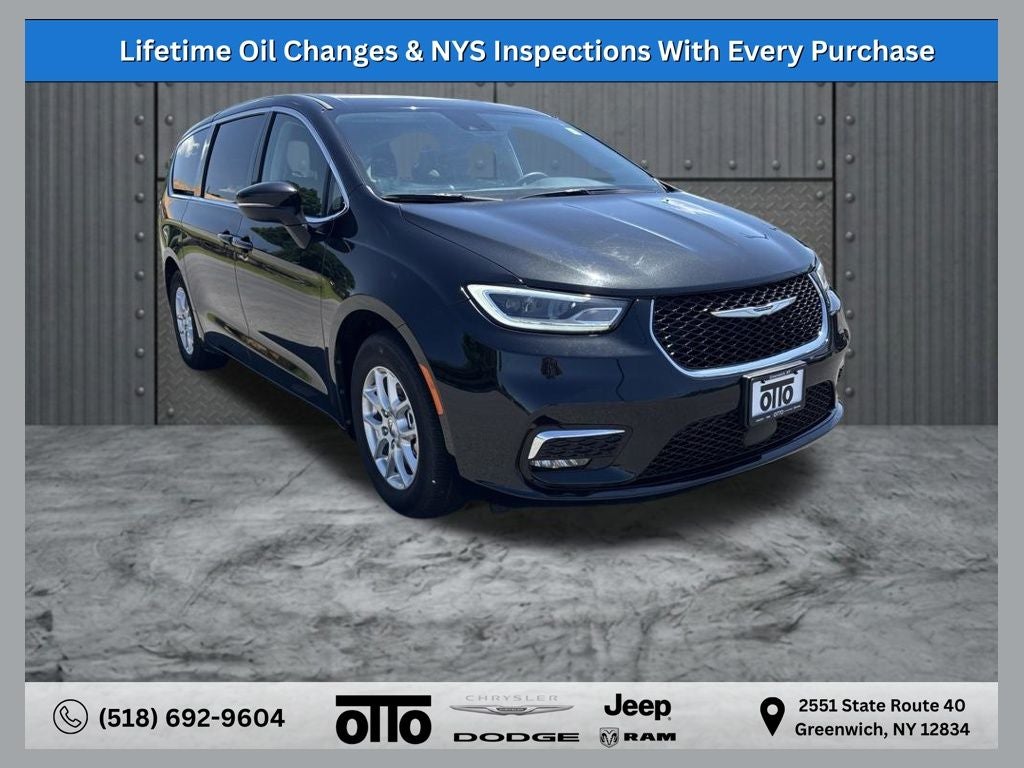 2023 Chrysler Pacifica Touring L in Brilliant Black Crystal Pearlcoat — front three-quarter view
